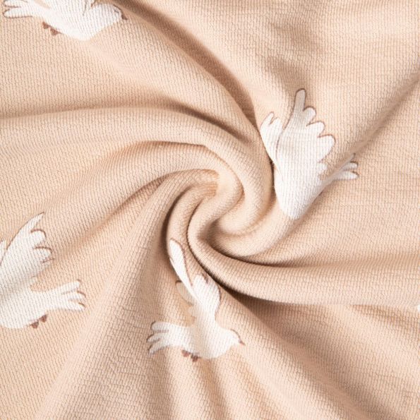 Tissu Maille Jersey Coton Ana colombes Blanc sur fond Beige - Par 10 cm