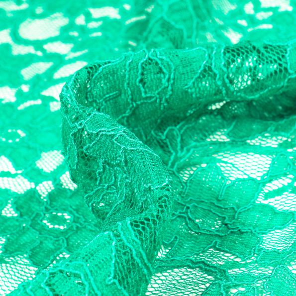 Tissu Dentelle Eva sur fond Vert - Par 10 cm