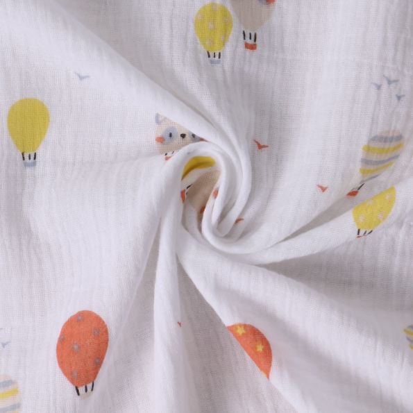 Tissu Double gaze de Coton Gaspard montgolfières sur fond Blanc - Par 10 cm
