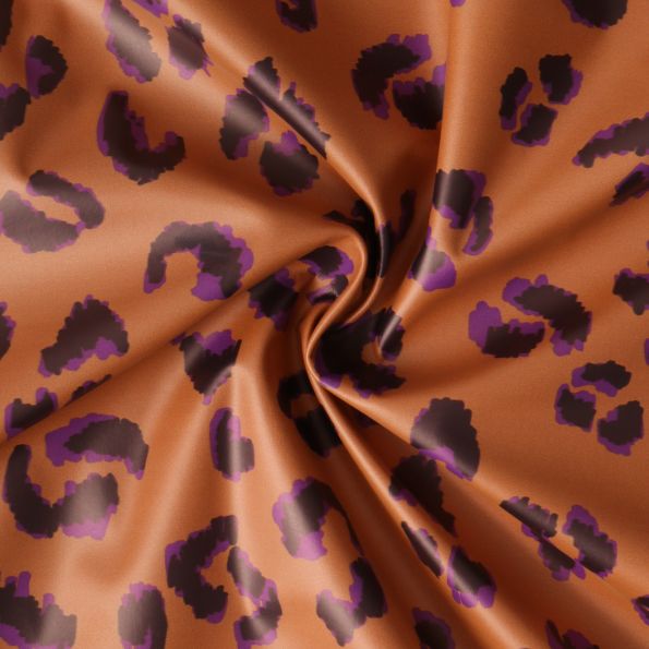 Tissu Imperméable Savannah Pop léopard Violet sur fond Terracotta - Par 10 cm