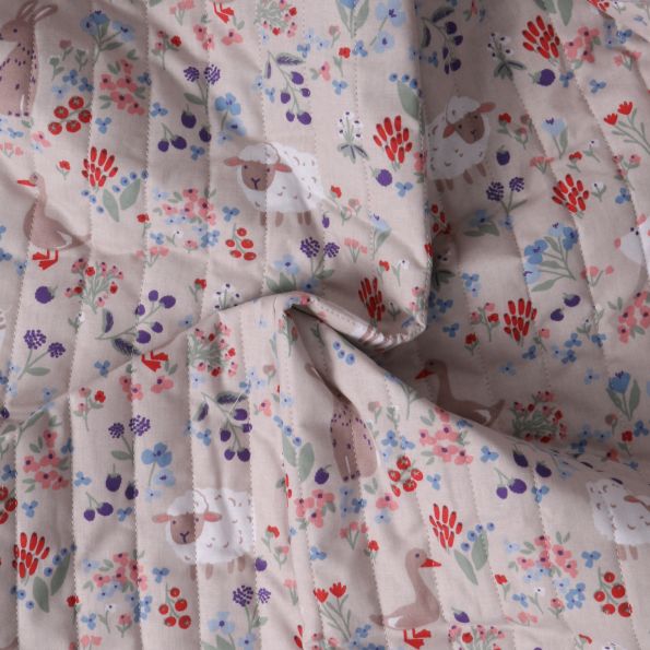 Tissu Matelassé Coton réversible  La Prairie Enchanté sur fond Vieux rose - Par 10 cm