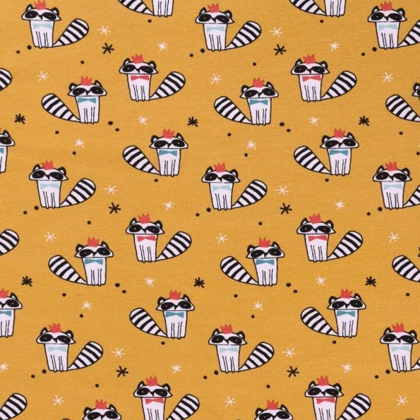 Tissu Jersey Arty Ratons laveurs noirs, blancs et dorés sur fond Moutarde - Par 10 cm