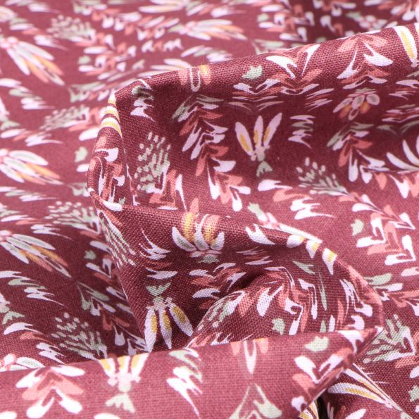 Tissu Coton imprimé Arty Dezo sur fond Lie de vin - Par 10 cm