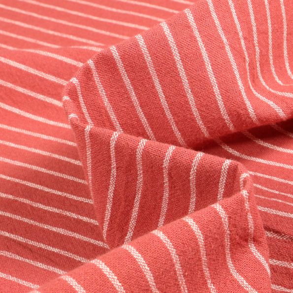 Tissu Coton lavé Rina sur fond Terracotta - Par 10 cm