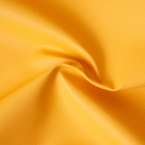 Simili cuir d'ameublement uni sur fond Jaune safran - Par 10 cm
