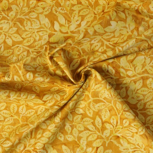 Tissu Coton imprimé Batik Sunleaf sur fond Jaune or - Par 10 cm