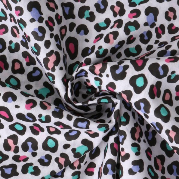 Tissu Coton imprimé  maxi Léomultico sur fond Blanc - Par 10 cm