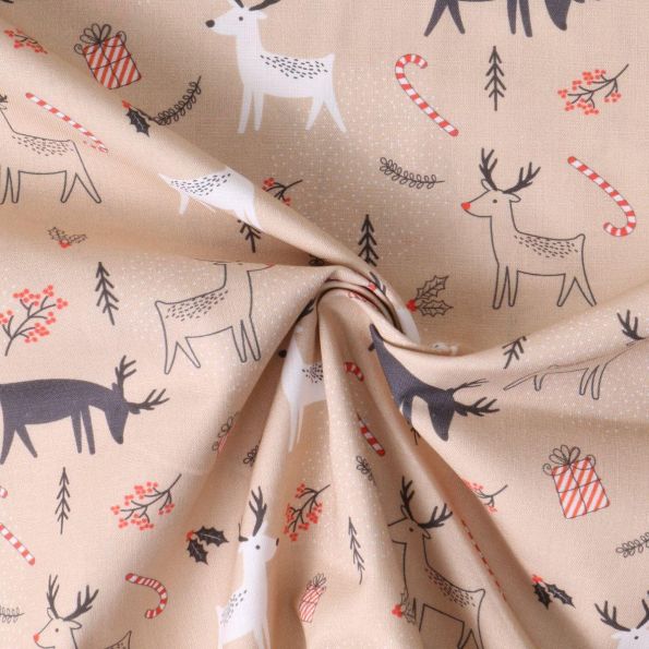Tissu Coton imprimé  Nordikka rennes stylisés sur fond Beige sable - Par 10 cm