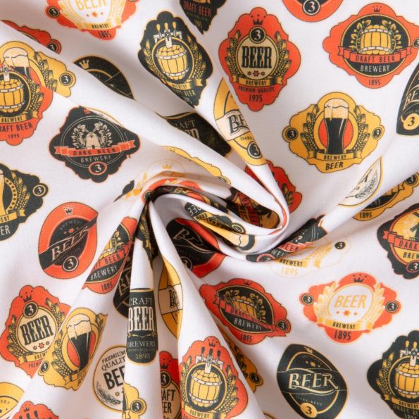 Tissu Coton imprimé Bières Academy sur fond Blanc - Par 10 cm