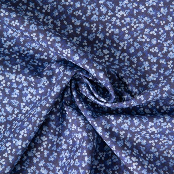 Tissu Popeline de Coton légère imprimé moucheté floral sur fond Bleu indigo - Par 10 cm