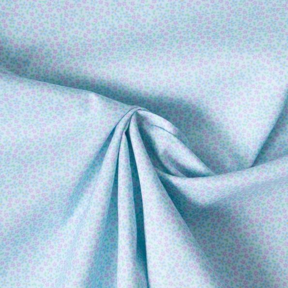 Tissu Popeline de Coton légère Tapis floral sur fond Bleu ciel - Par 10 cm