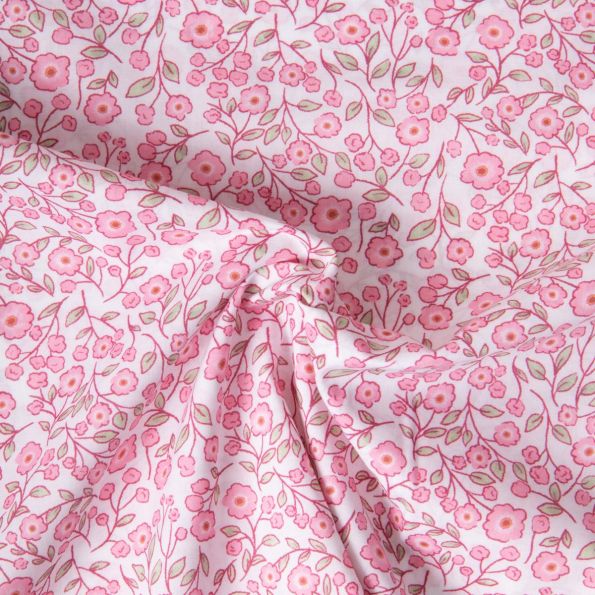 Tissu Popeline de Coton légère floral printanier rose sur fond Blanc - Par 10 cm