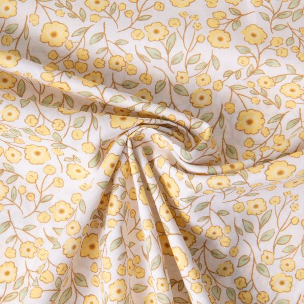 Tissu Popeline de Coton légère floral printanier jaune sur fond Blanc - Par 10 cm