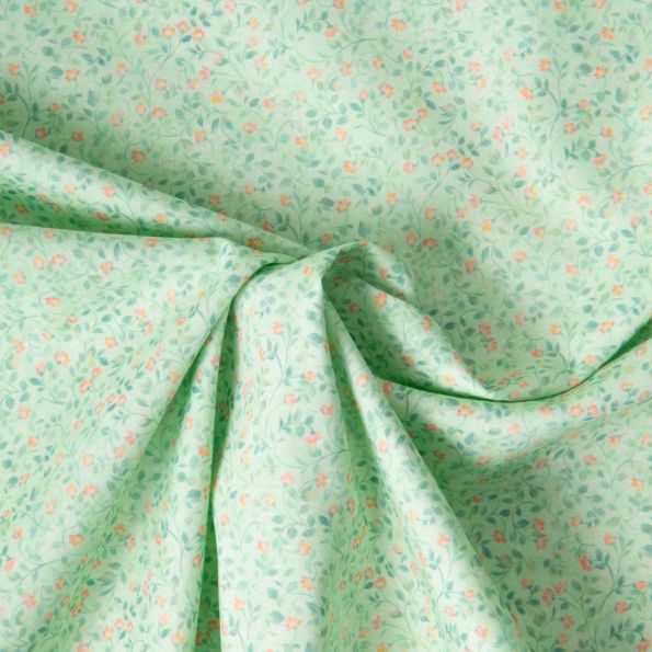 Tissu Popeline de Coton légère Fleur vert moyen et rose pêche sur fond Vert menthe clair - Par 10 cm