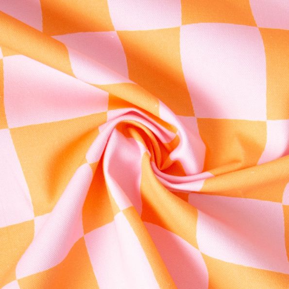 Tissu Toile de Coton d'ameublement Damier rose sur fond Orange - Par 10 cm