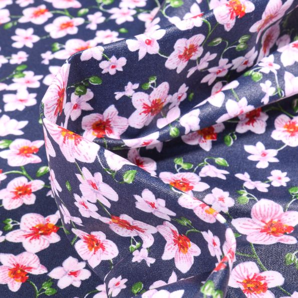 Tissu Coton enduit Orchidées bouquet sur fond Bleu marine - Par 10 cm