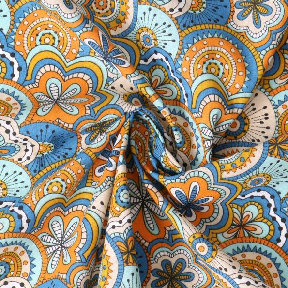 Tissu Popeline de Coton  Eugénie mandala floral Orange sur fond Bleu - Par 10 cm