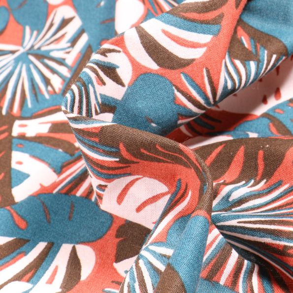 Tissu Coton imprimé Arty Gwada sur fond Terre de Sienne - Par 10 cm