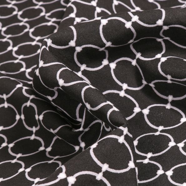 Tissu Viscose Arty Anneaux argent sur fond Noir - Par 10 cm