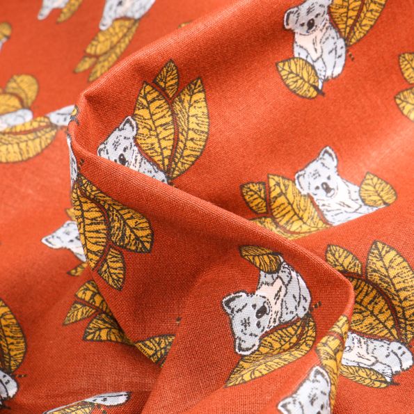 Tissu Coton imprimé Arty Koala sur fond Orange - Par 10 cm