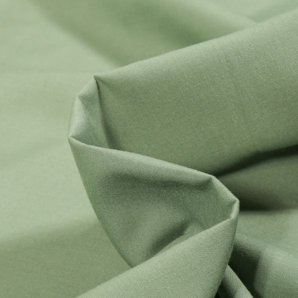 Tissu Popeline de coton mercerisé uni Elise Vert amande - Par 10 cm