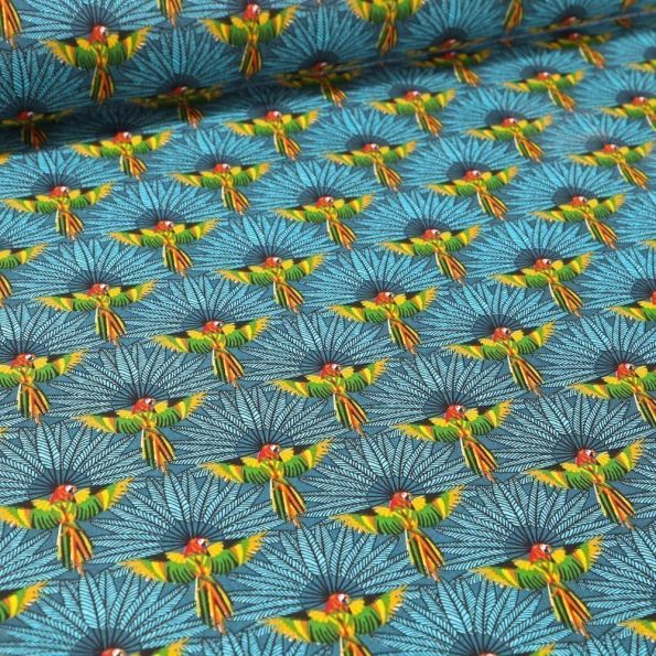 Tissu Coton imprimé Arty Perroquet et plumes sur fond Bleu - Par 10 cm