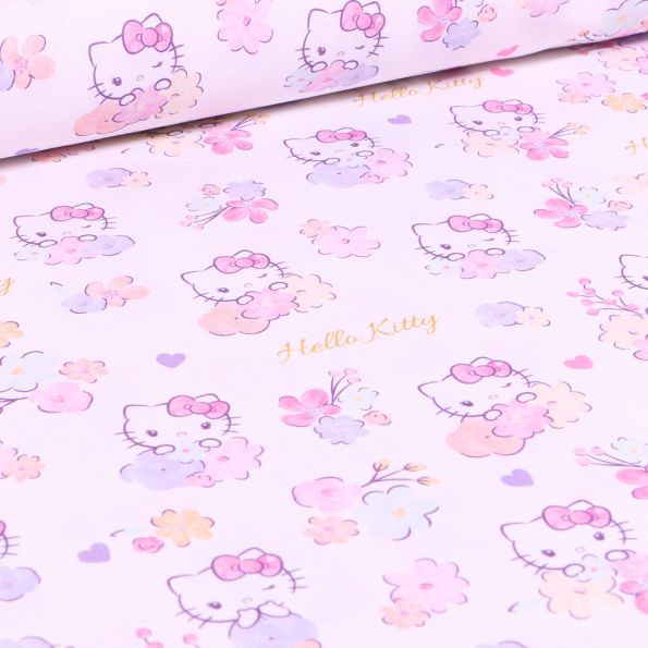 Tissu Hello Kitty Flowers sur fond blanc - Par 10 cm