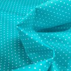 Tissu Coton enduit Little dots sur fond Bleu turquoise