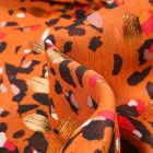 Tissu Voile Polyester Taches léopard lurex sur fond Orange