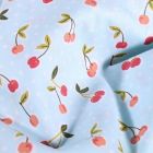 Tissu Coton imprimé LittleBird Cerises Pop sur fond Bleu ciel - Par 10 cm