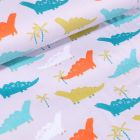 Tissu Coton imprimé LittleBird Dinosaures orange, bleus et verts sur fond Blanc