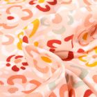 Tissu Velours milleraies Fleurs colorées sur fond Saumon