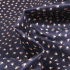 Tissu Coton satiné extensible Eclats de pissenlits sur fond Bleu marine