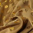 Tissu Viscose Feuilles métallisées dorées sur fond Vert kaki