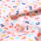 Tissu Coton MC Fabrics Chiffres multicolores sur fond Blanc