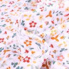 Tissu Jersey Coton Petites fleurs colorés sur fond Blanc