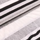 Tissu Jersey polyviscose Rayures texturées noires sur fond Blanc - Par 10 cm