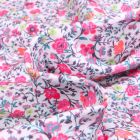 Tissu Jersey Coton Sweet Flower Lillie rose sur fond Blanc