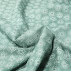 Tissu Coton imprimé Soleils stylisés sur fond Vert d'eau - Par 10 cm