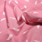 Tissu Coton imprimé Petites plumes sur fond Rose - Par 10 cm