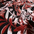 Tissu Viscose texturé Aquarelle de feuilles terracota sur fond Noir - Par 10 cm