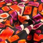 Tissu Coton Satiné extensible Formes abstraites orange sur fond Noir