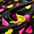 Tissu Satin Coeurs multicolores sur fond Noir