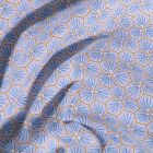 Tissu Coton imprimé Arty Riad sur fond Bleu ciel - Par 10 cm