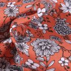 Tissu Coton imprimé Arty Fleurs black & white sur fond Orange - Par 10 cm