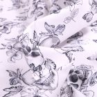 Tissu Coton enduit Têtes de mort et papillons sur fond Blanc