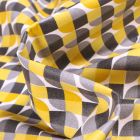 Tissu Coton enduit Seventies jaune et gris sur fond Blanc