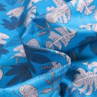 Tissu Coton imprimé Kanna sur fond Bleu turquoise