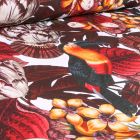Tissu Toile de Coton Bachette Toucans et feuilles colorés sur fond Blanc