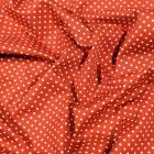 Tissu Coton imprimé Petits pois 3 mm sur fond Terracotta - Par 10 cm
